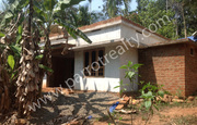 13 cent land with a small incomplete house for sale in Near nadavayal