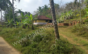 2.7 acre land with house for sale in near Cherukattoor. 