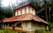 4 acre land with 2 floor old  house for sale in poothadi. 