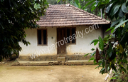 Land with a small house for sale in Padinjarathara.