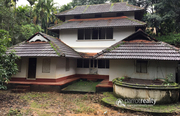 Old Traditional triple story house with 1.30 acre land near panamaram