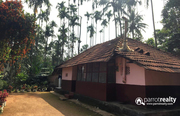  2.24 acre land with 5bhk old house for sale in Kavumannam @ 1 Cr